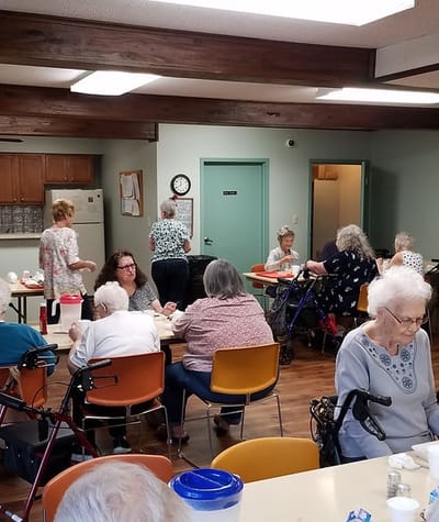 Residents engaged in activities in a common area