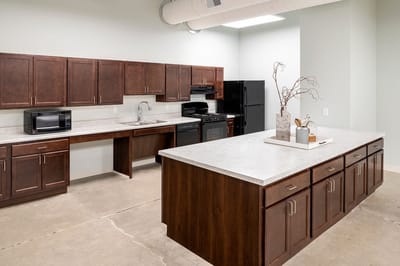 Modern kitchen with wooden cabinets and appliances