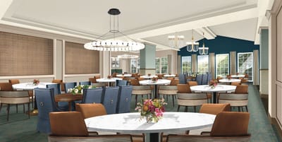 Bright dining room with elegant tables and decor