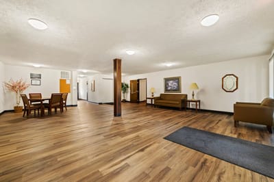 Interior view of a common area with seating and tables