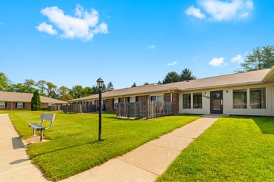 Building exterior of Fairington of Anderson with green lawn