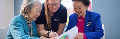Residents and staff engaged in a creative activity