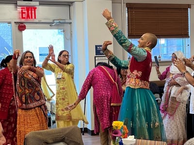 Residents participating in a cultural dance event.