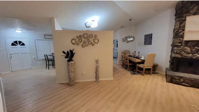 Welcoming interior common area with dining space.