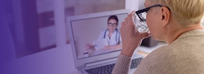 Older adult participating in a telehealth appointment.