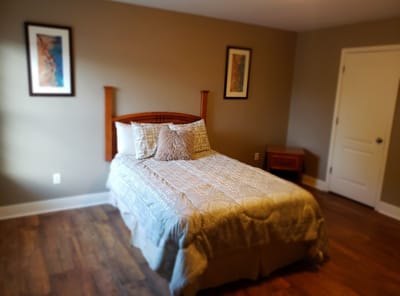 Cozy private room with bed and decor