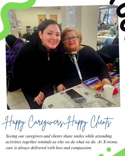 Caregiver and client smiling during an activity.