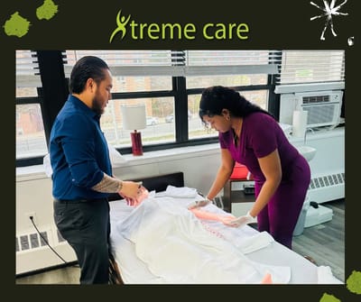 Staff assisting with resident care in a room.