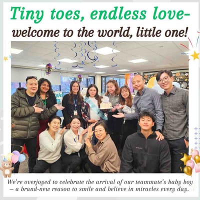 Staff celebrating a newborn arrival with a cake.