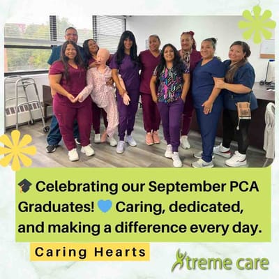 Staff and PCA graduates celebrating together