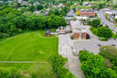 Aerial view of the facility and surrounding landscape.