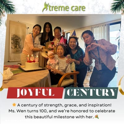 Residents and staff celebrating a 100th birthday.