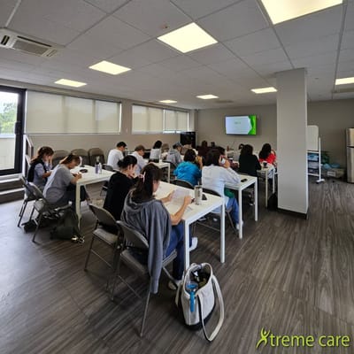 Residents and staff engaged in an activity
