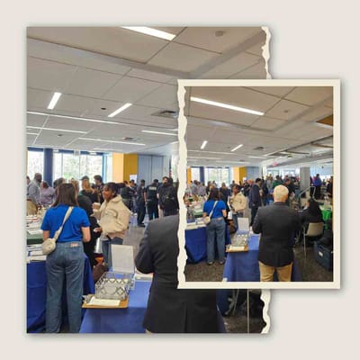 Crowded interior space with people participating in an event.