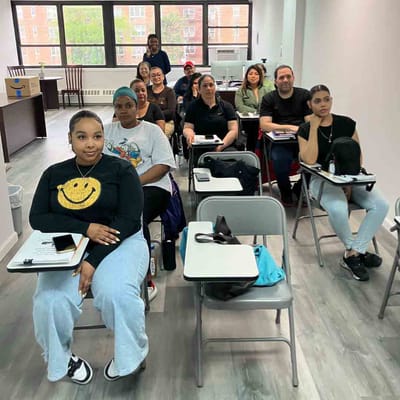 Residents and staff in a learning environment