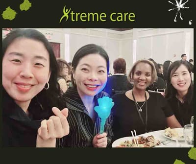 Four women enjoying a celebration at a dining table