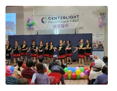 Residents performing in a lively dance event.