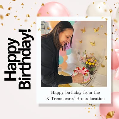 Resident celebrating a birthday with cake and flowers.