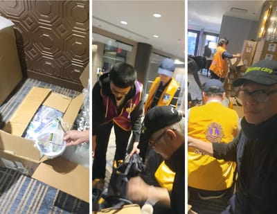 Volunteers organizing supplies in a common area