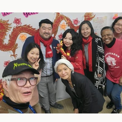 Group of staff and residents celebrating together
