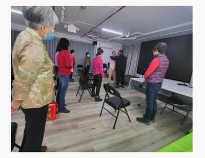 Group of people participating in an indoor activity