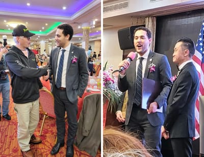 Two men speaking on stage at an event