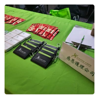Table setup with name tags and promotional materials.