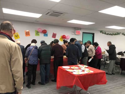 Residents enjoying a meal at a shared event