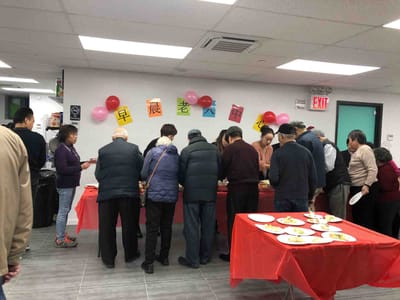 Residents enjoying food at a community event