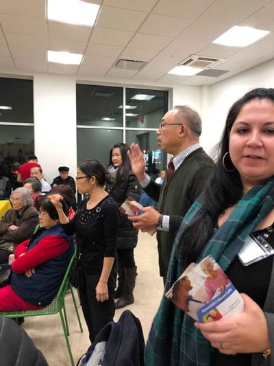 Residents and staff engaged in a community event.