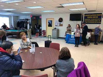 Residents engaging in activities at a community space.