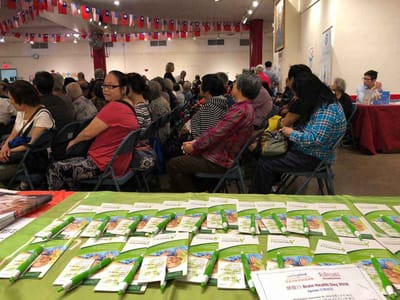 Residents gathered in a community hall for an event.