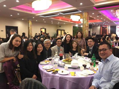 Group of people dining and celebrating together