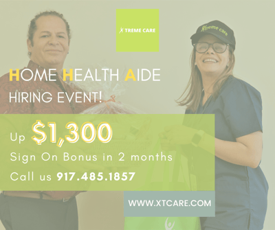 Staff members at a hiring event with promotional materials.