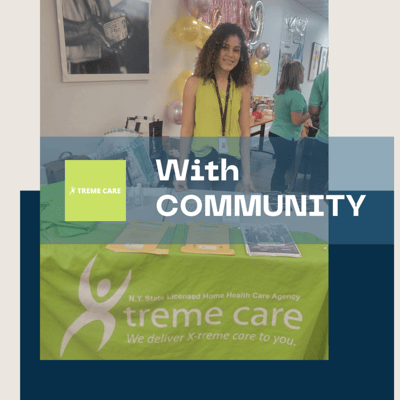 Staff member with community event materials.