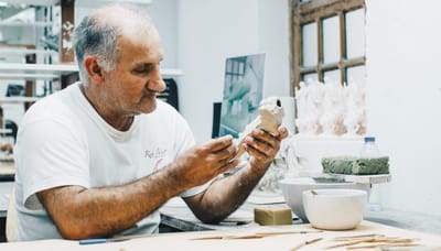 Senior man sculpting in an art studio