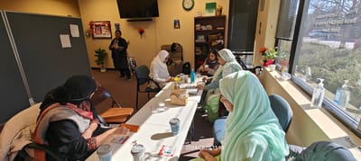 Residents participating in an activity in a common area