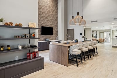 Modern communal kitchen area with seating