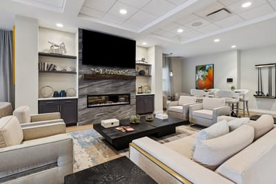 Modern common area with comfortable seating and decor.
