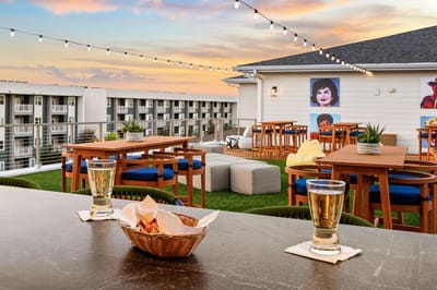 Outdoor dining area with drinks and snacks.