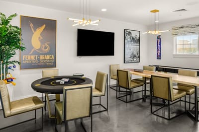 Modern common area with seating and decor.