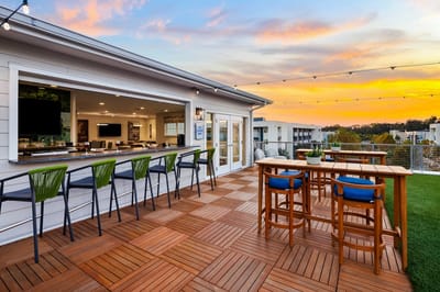 Outdoor patio with seating at sunset