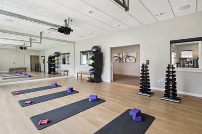 Exercise mats and weights in a fitness room