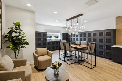 Modern common area with seating and dining table