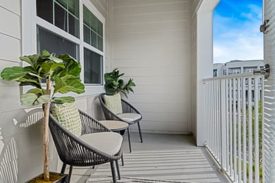 Balcony with seating and potted plants