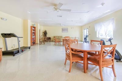 Common area with fitness equipment and seating