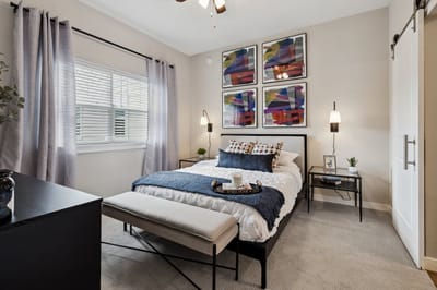 A cozy resident bedroom with modern decor