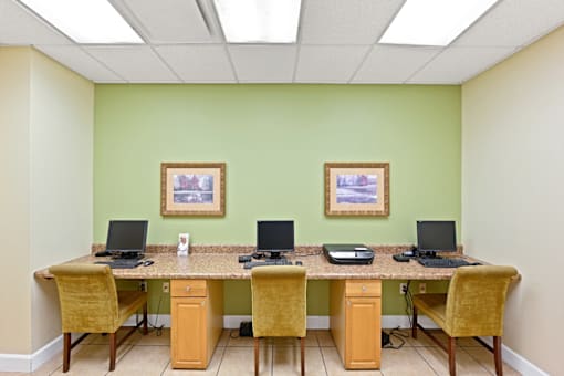 Computer area with desks and monitors