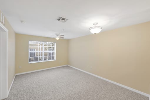 Empty resident room with light-colored walls