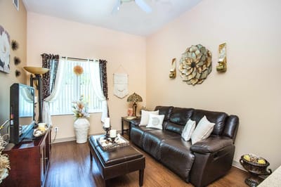 Cozy living room with decorative elements and furniture.